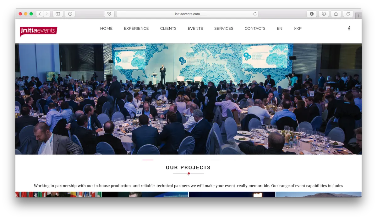 Initia Events website with a geometric event image and service navigation